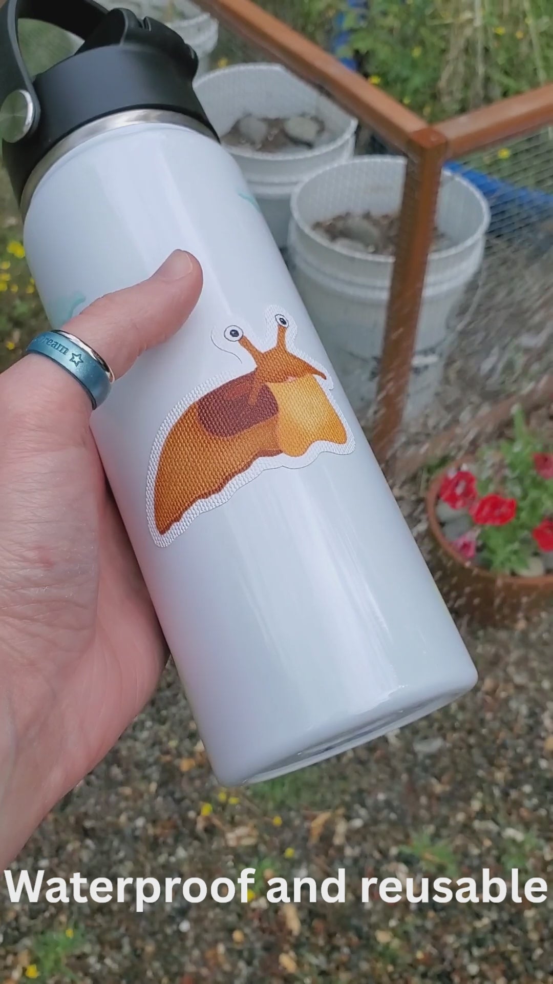 Showing the sticker being sprayed with water and that it can be stuck over and over again on different surfaces.